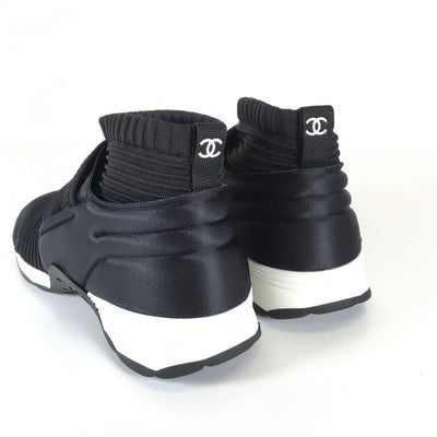 Chanel High Top Sneakers