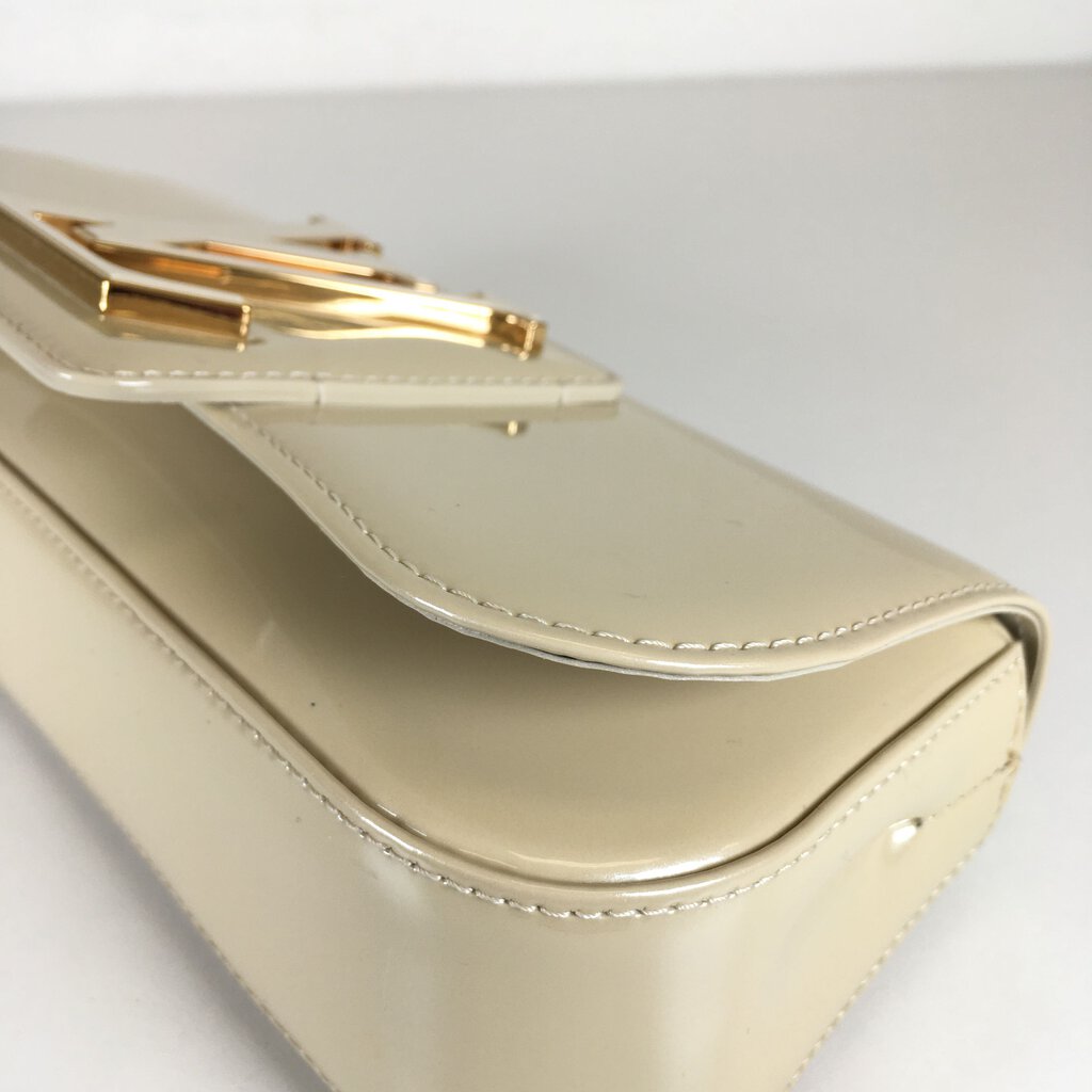 Louis Vuitton Louise Clutch