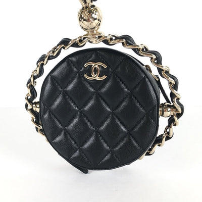 Chanel Rotating Circle Clutch