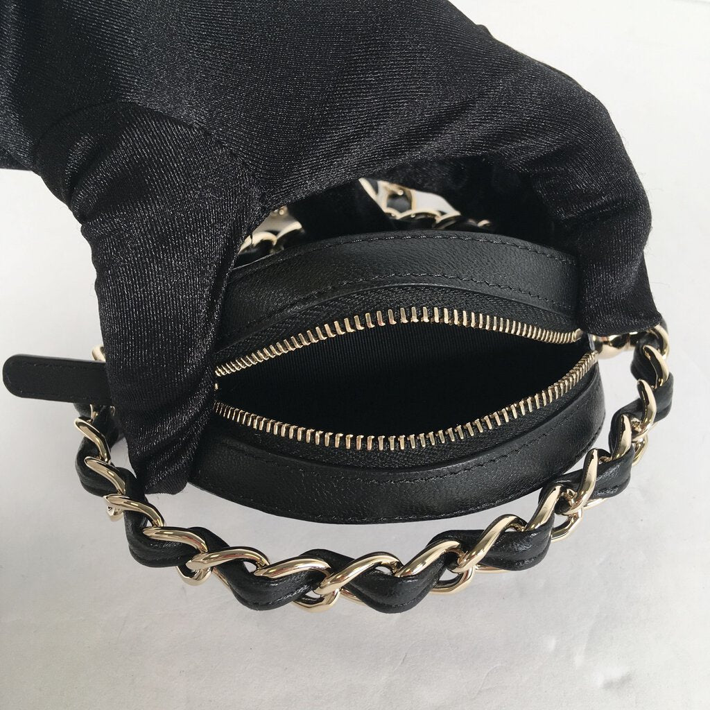 Chanel Rotating Circle Clutch