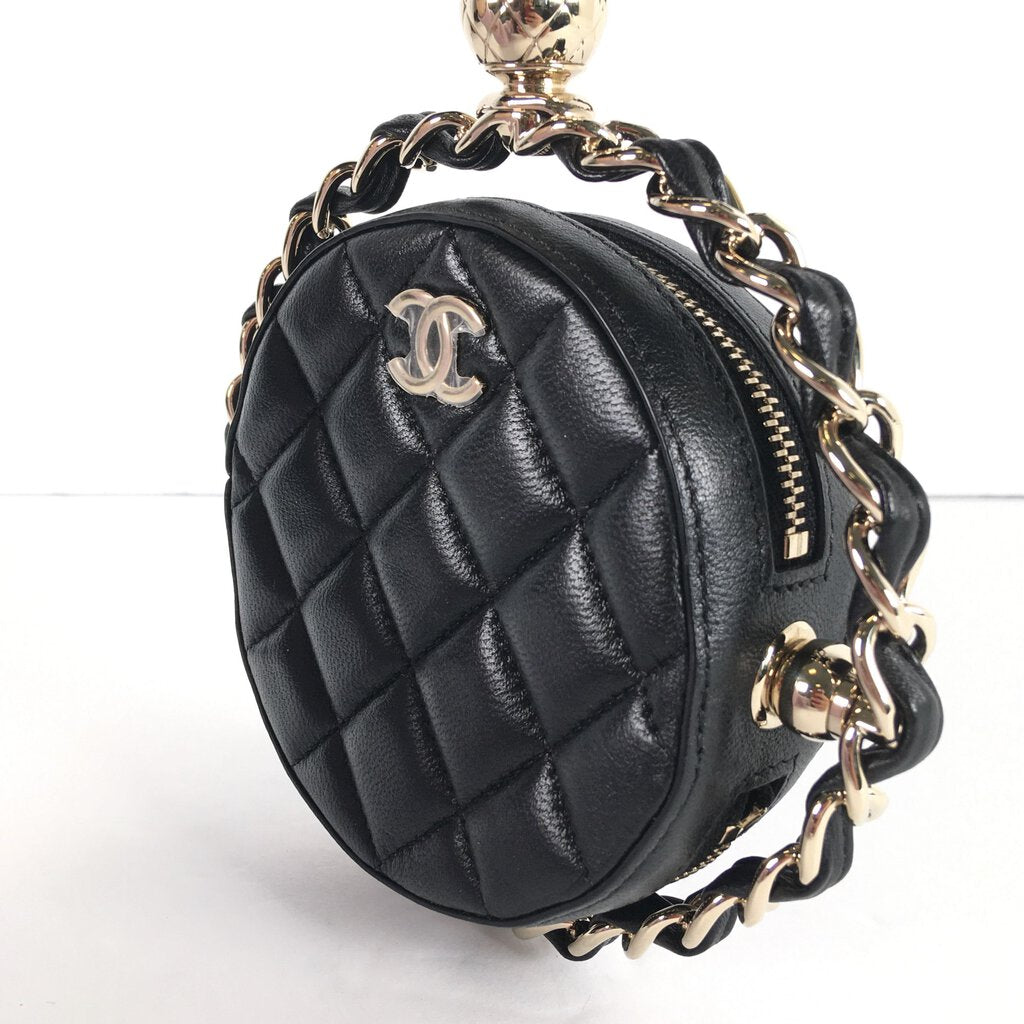 Chanel Rotating Circle Clutch