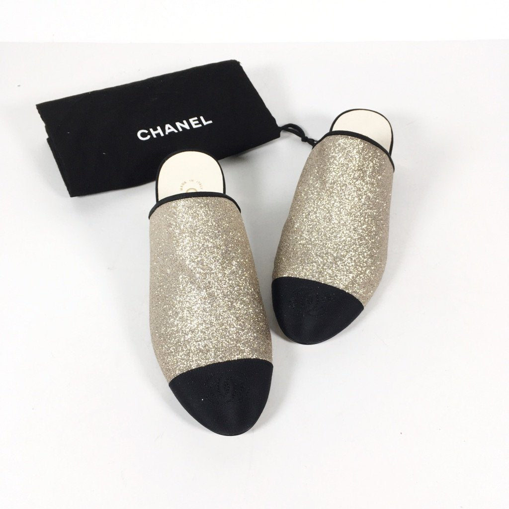 Chanel mules, gold shimmer with black toes